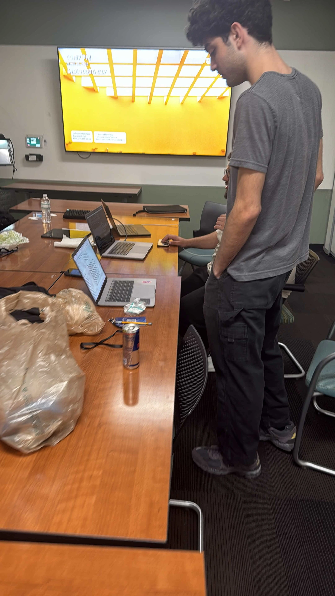 Working together in the HackUSF hackathon room